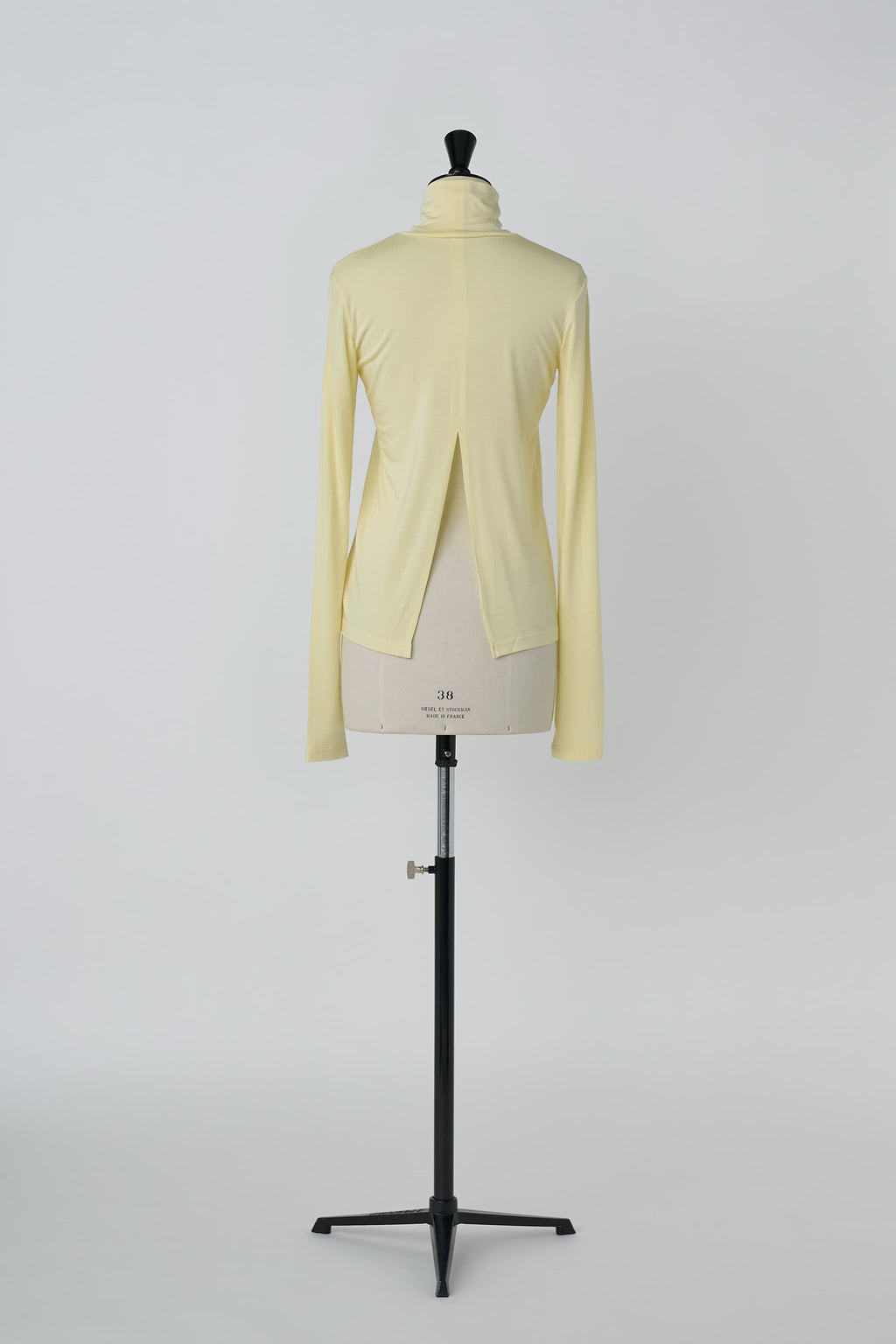Open back turtle-neck cut sew