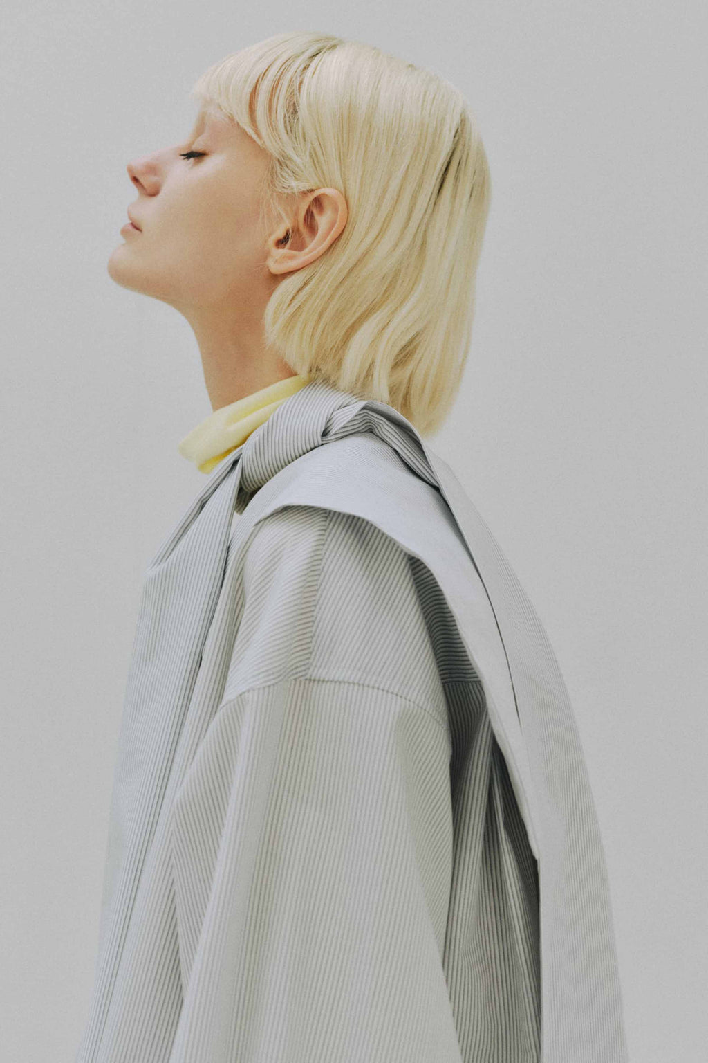 Open back turtle-neck cut sew